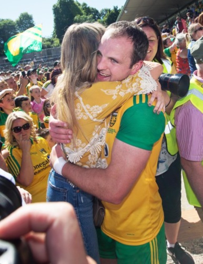 Michael Murphy celebrates after the game with girlfriend Annie Keeney