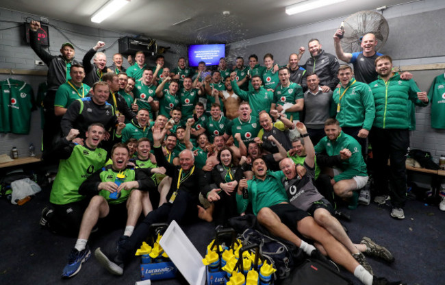 Ireland players and staff celebrate in the dressing room after the game