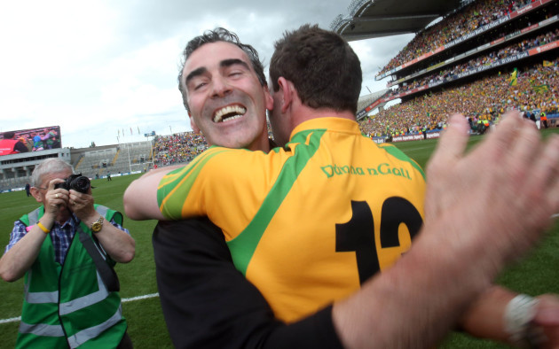 Jim McGuinness celebrates at the final whistle with Patrick McBrearty