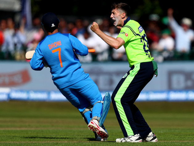 Peter Chase celebrates as MS Dhoni is caught by Stuart Thompson
