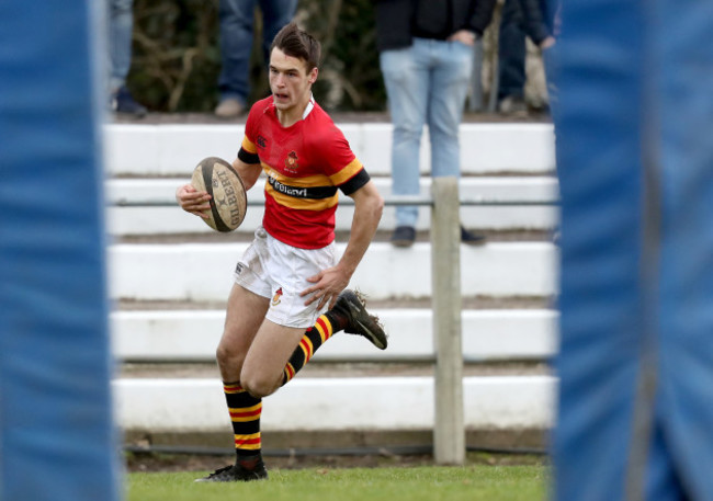Eoghan Barrett on his way to scoring a try
