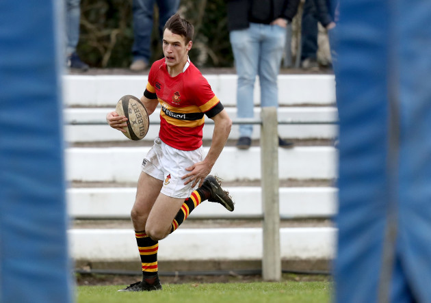 Eoghan Barrett on his way to scoring a try