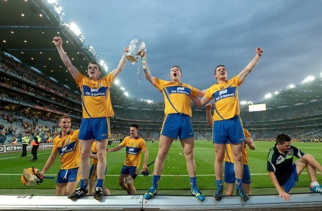 Tony Kelly, Aaron Cunningham and John Conlon celebrate with the Liam McCarthy