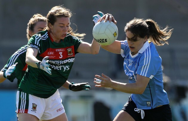 Noelle Healy tackled by Sarah Tierney