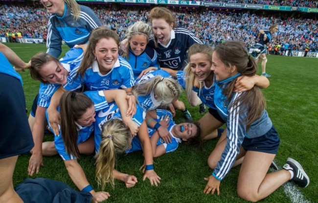 Dublin players celebrate with Noelle Healy