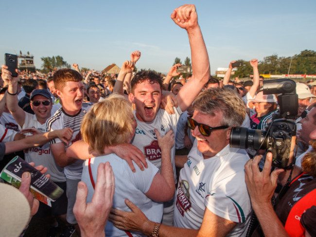 David Hyland celebrates with his mother Maire after the game