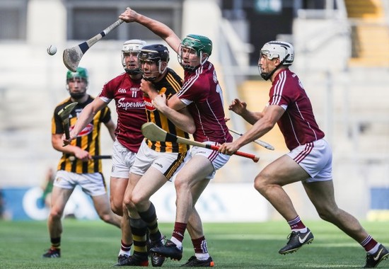 Joe Canning and Cathal Mannion with Walter Walsh