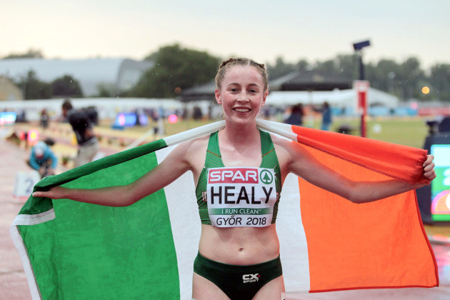Sarah Healy celebrates winning a gold medal