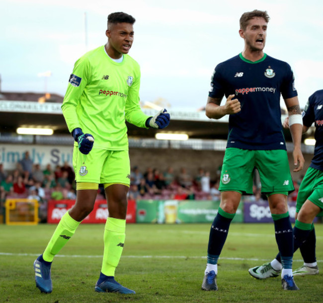 Gavin Bazunu celebrates saving a penalty