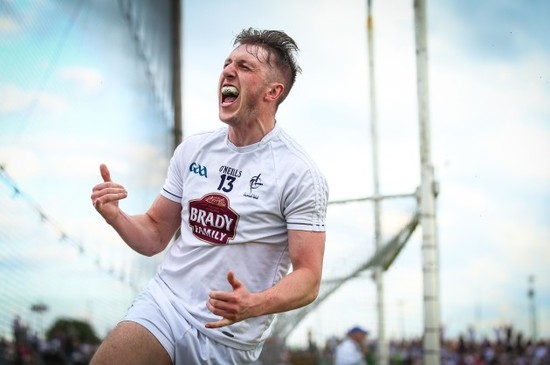 Neil Flynn celebrates scoring a goal