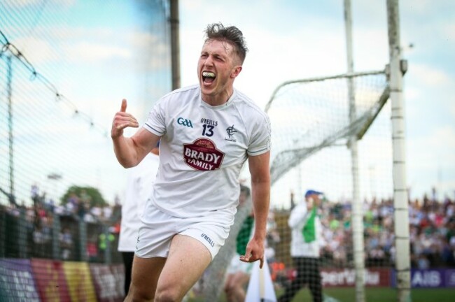 Neil Flynn celebrates scoring a goal
