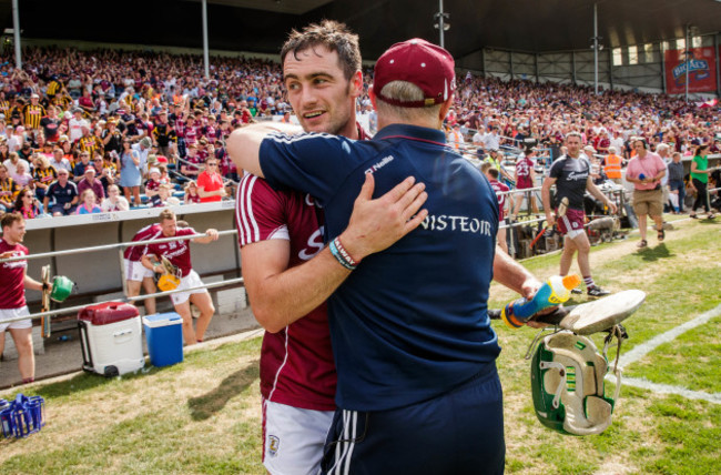 Michael Donoghue celebrates with David Burke