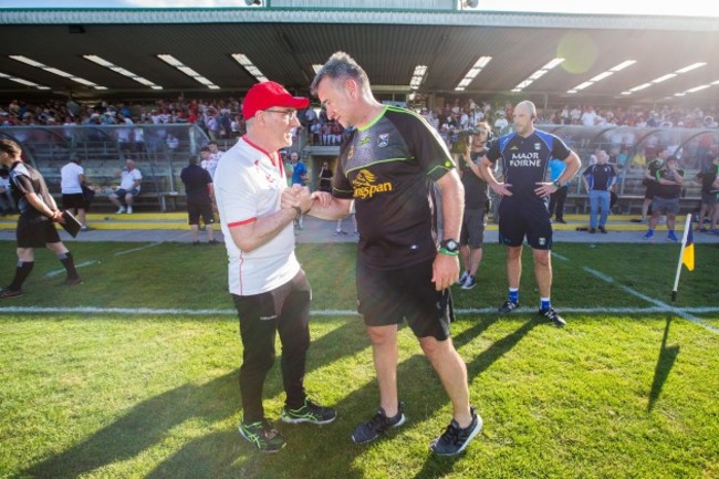 Matthew McGleenan with manager Mickey Harte after the game