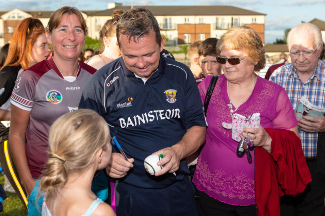 Davy Fitzgerald signs autographs after the game