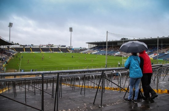 Fans watch the match prior to the senior game