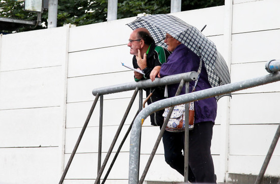 Fans watch the match prior to the senior game