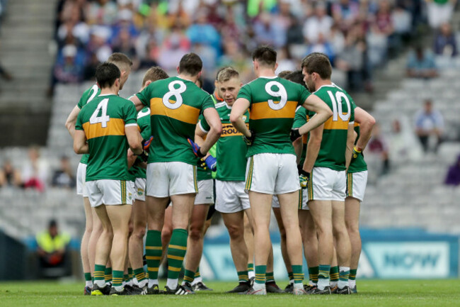 The Kerry team huddles during the game