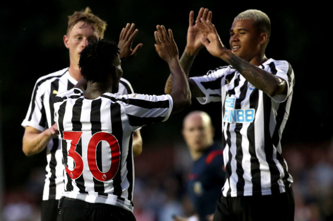 Christian Atsu celebrates scoring a goal with Kenedy