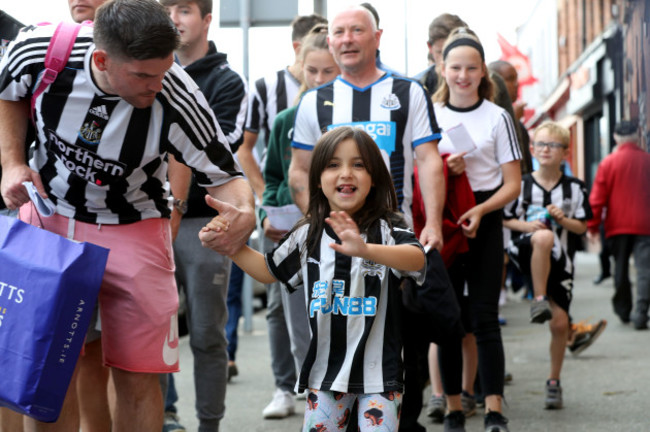 A young Newcastle United fan arriving at Richmond Park