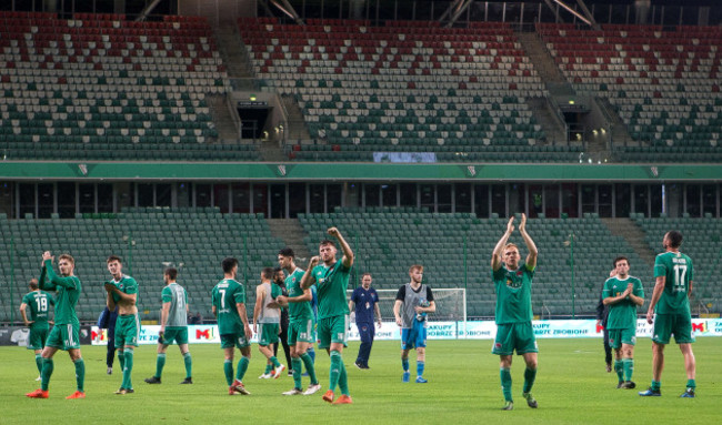 Cork's players applaud their fans