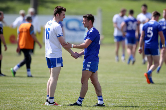 Jason Curry congratulates Ryan Wylie at the end of game