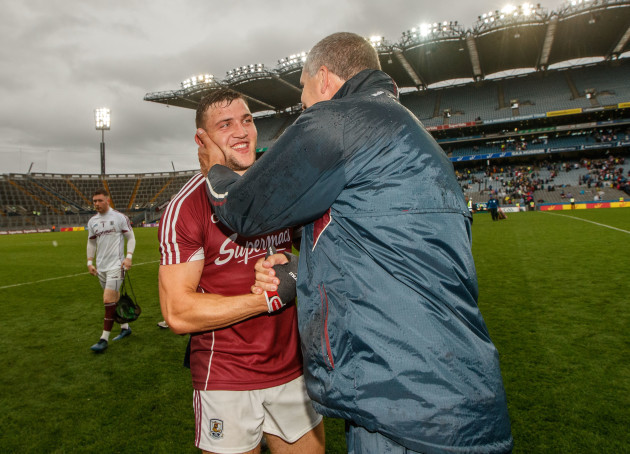 Damien Comer and manager Kevin Walsh celebrate