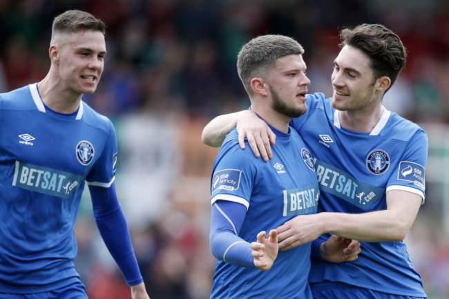 Danny Morrissey celebrates scoring a goal with Cian Coleman and Eoin Wearen