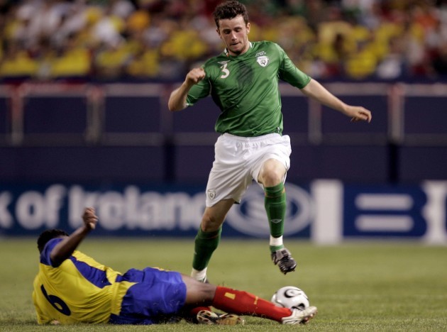 Luis Caicedo of Equador tackles Stephen O'Halloran of Ireland