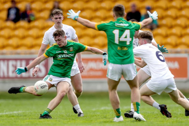 Bryan McCormack scores a goal despite Kevin Kelleher