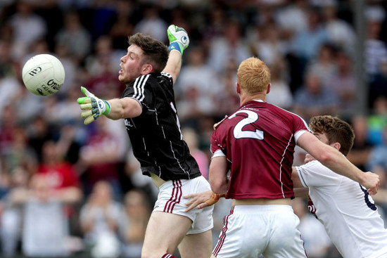 Ruairí Lavelle and Declan Kyne with Kevin Feely