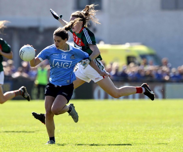 Noelle Healy tackled by Sarah Tierney
