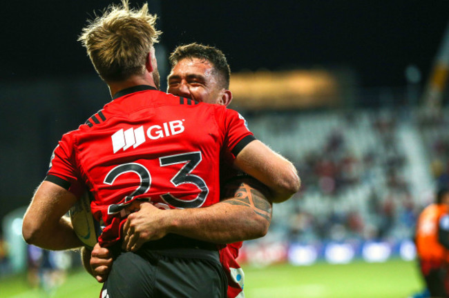 Braydon Ennor celebrates his try with Codie Taylor