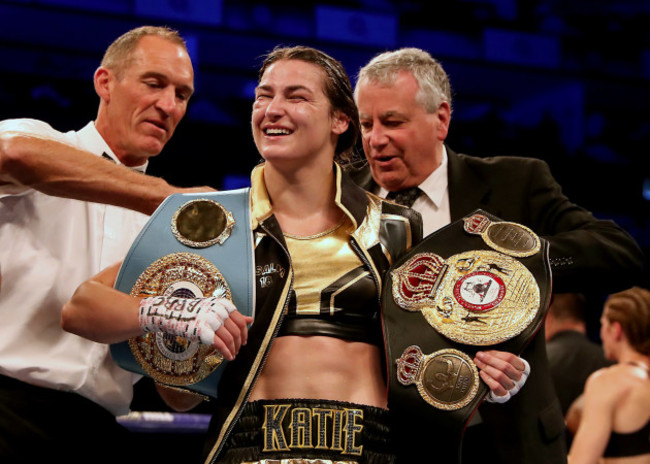 Katie Taylor receives her WBA and IBF belts