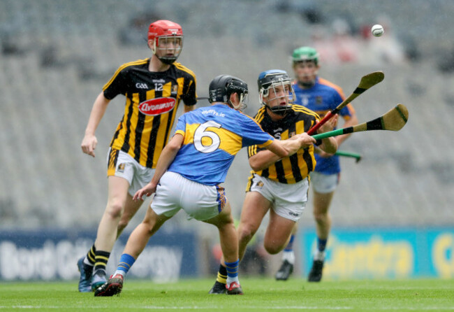 Jack Buggy is tackled by Sean Phelan