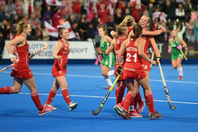 Giselle Ansley celebrates her goal with teammates