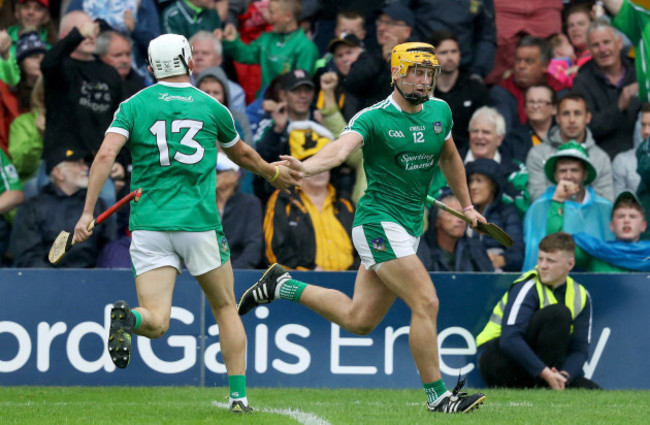 Tom Morrissey celebrates scoring a late point with Aaron Gillane