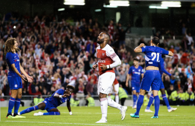 Alexandre Lacazette celebrates scoring a late goal