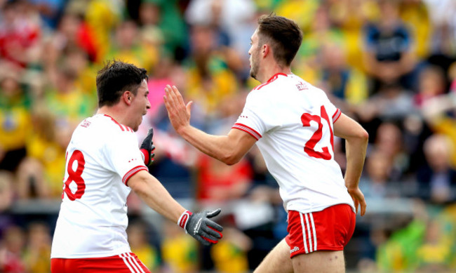 Harry Loughran celebrates scoring a goal with Lee Brennan