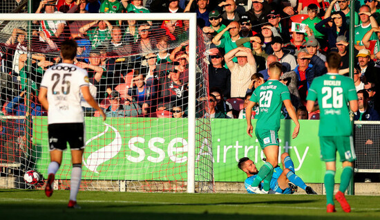 Mark McNulty is beaten by a shot from Jonathan Levi to concede a goal