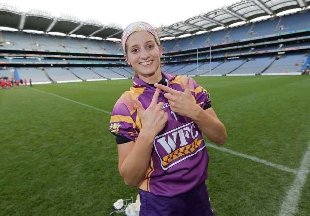 Mags D'Arcy celebrates winning a third successive All-Ireland title