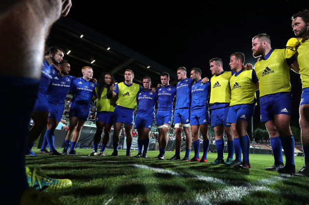 Rhys Ruddock speaks to the team in a huddle after the game