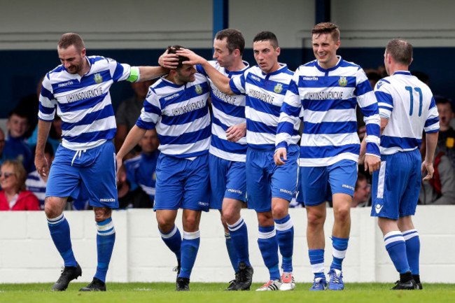 Sean Goulding celebrates scoring a goal with teammates