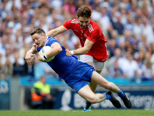 Conor McManus with Padraig Hampsey