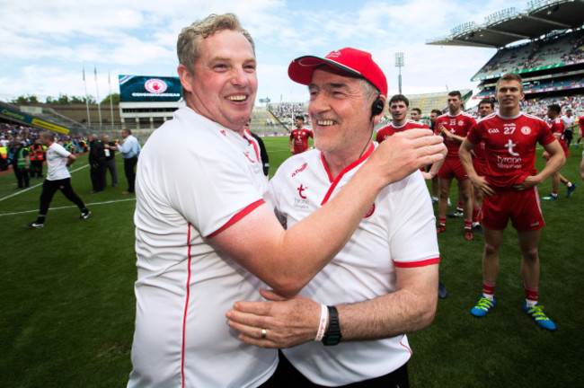 Greg Devlin celebrates with manager Mickey Harte after the game