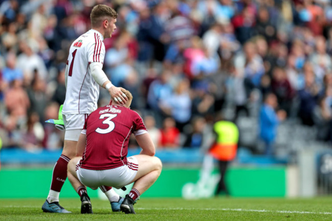 Ruairí Lavelle and Seán Andy Ó Ceallaigh dejected