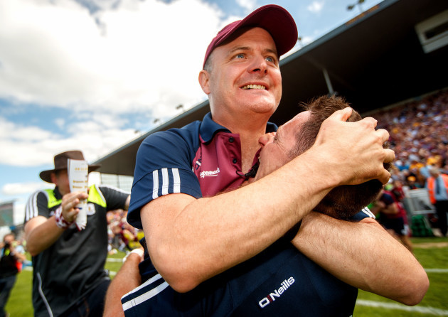 Michael Donoghue celebrates with selector Noel Larkin after the game