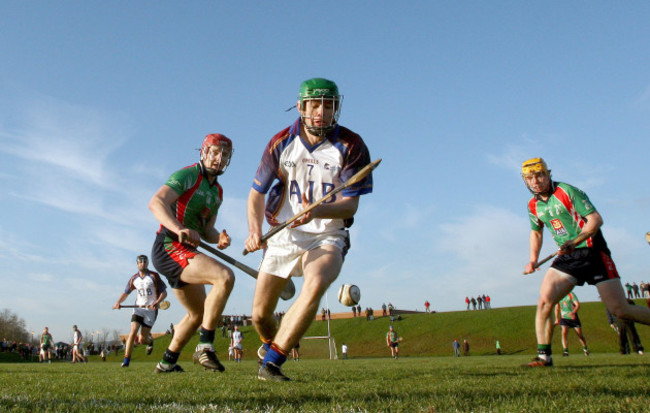 Joe Canning and Paul Browne close in on Martin Walsh