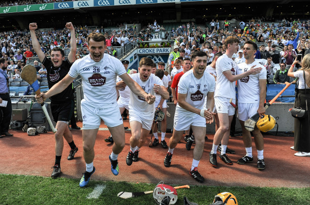 Kildare players run onto the pitch at the final whistle