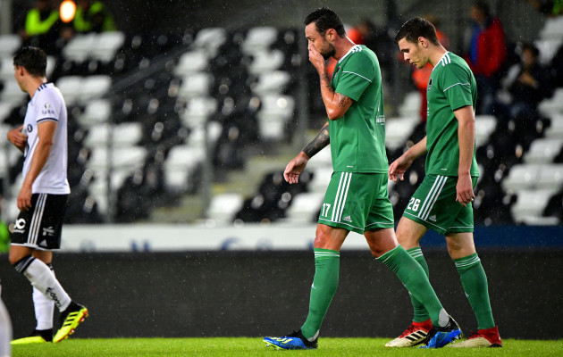 Damien Delaney and Garry Buckley dejected after their side conceded a goal