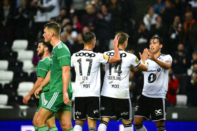 Alexander Soderlund celebrates scoring his sides second goal with Jonathan Levi and Anders Trondsen